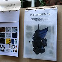 Poster der Ausstellung "Fluchtgepäck" von Yannik Rohloff.